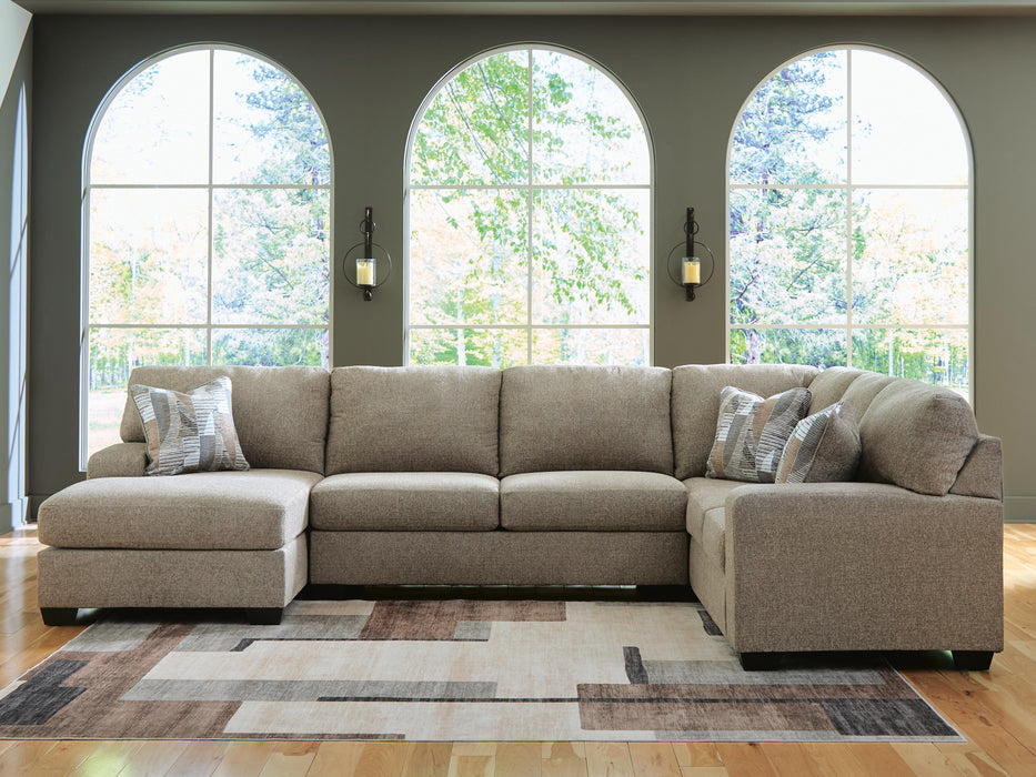 Newellen Sleeper Sectional with Chaise - MI Hometown Furnishings (MI)*