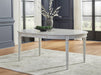 Montelaine Dining Extension Table - MI Hometown Furnishings (MI)*
