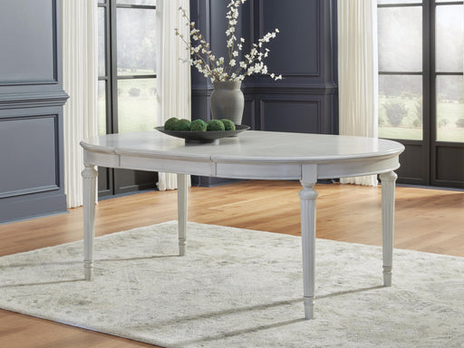 Montelaine Dining Extension Table - MI Hometown Furnishings (MI)*