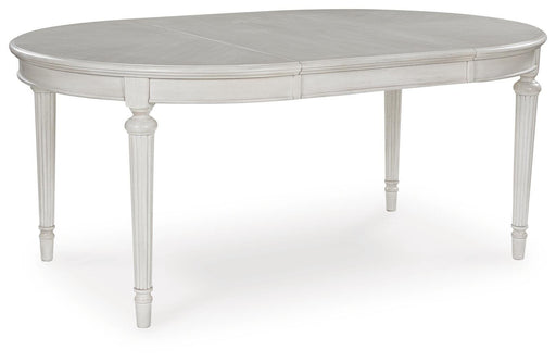 Montelaine Dining Extension Table - MI Hometown Furnishings (MI)*