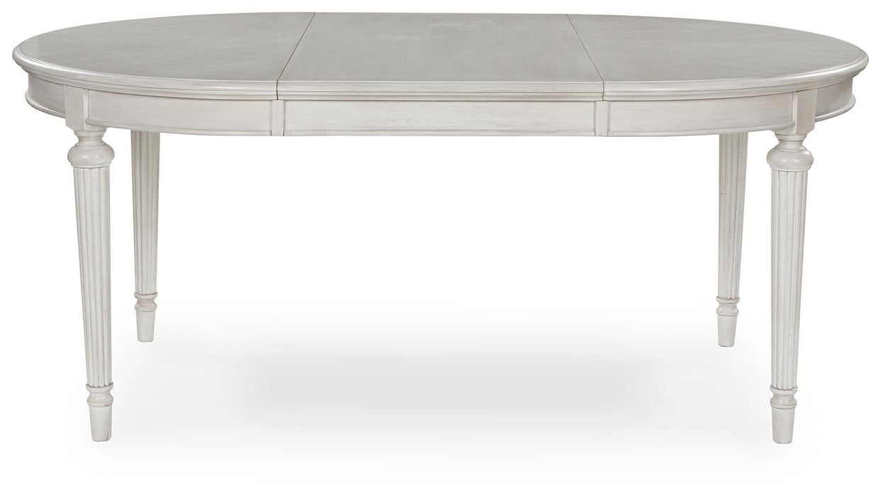 Montelaine Dining Extension Table - MI Hometown Furnishings (MI)*