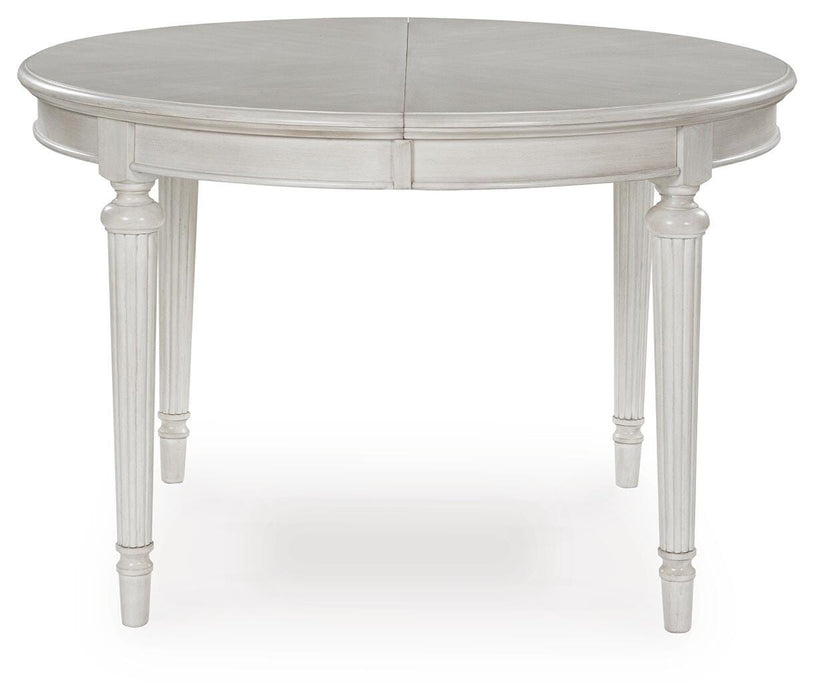 Montelaine Dining Extension Table - MI Hometown Furnishings (MI)*