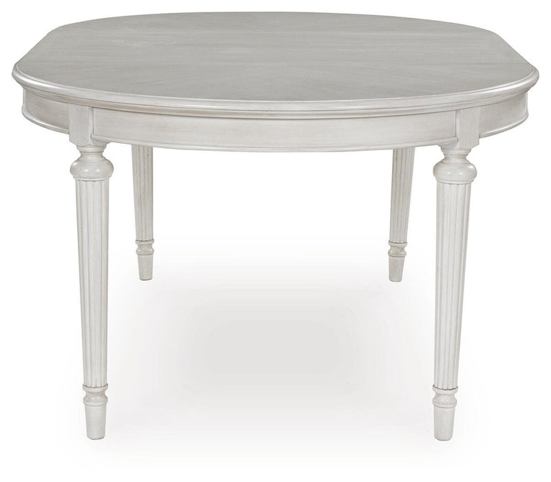 Montelaine Dining Extension Table - MI Hometown Furnishings (MI)*