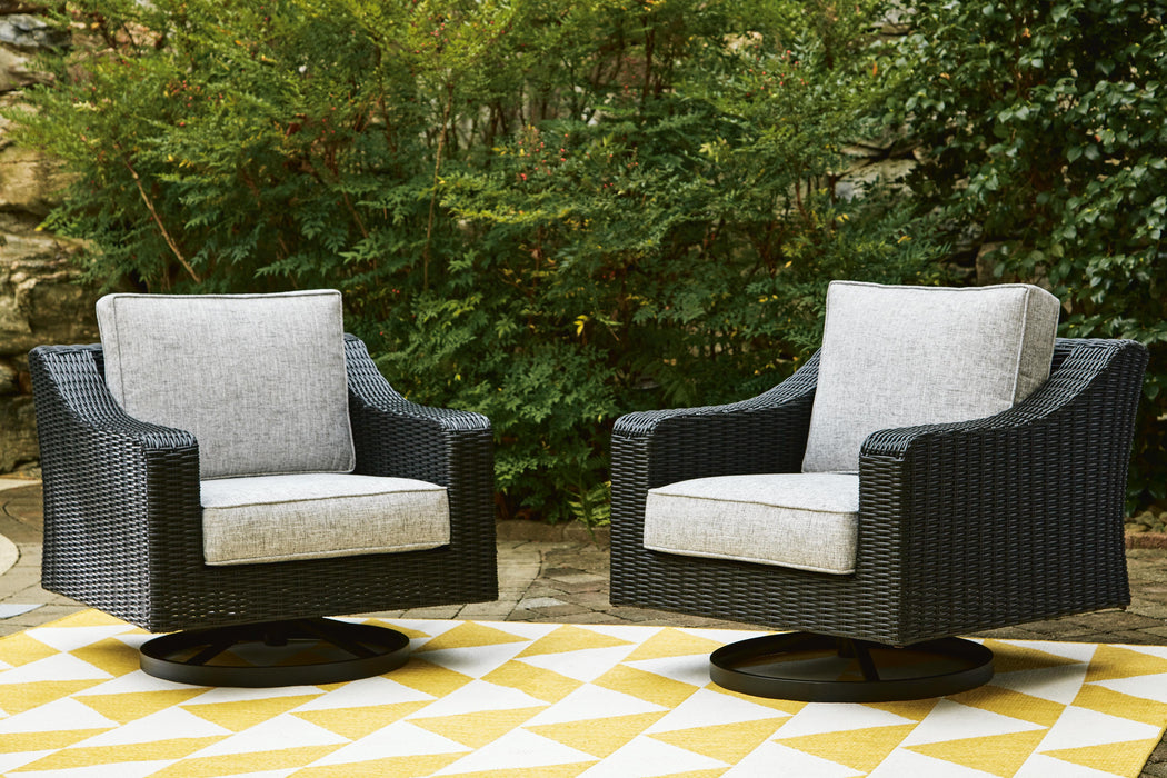 Beachcroft Outdoor Swivel Lounge with Cushion - MI Hometown Furnishings (MI)*