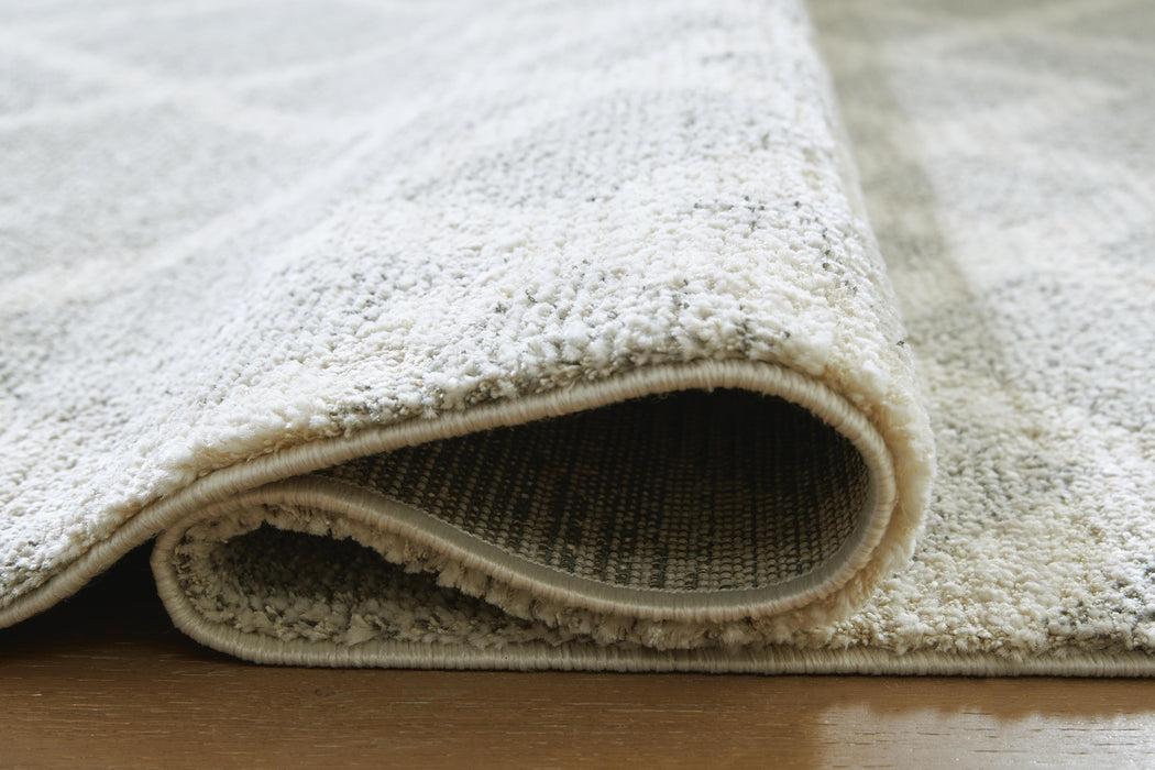 Unawick Large Rug - MI Hometown Furnishings (MI)*