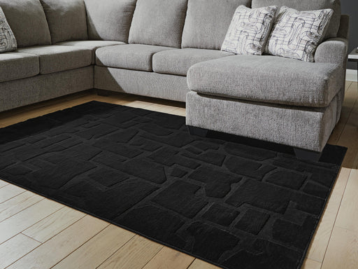 Gibbswell Washable 5' x 7' Area Rug - MI Hometown Furnishings (MI)*