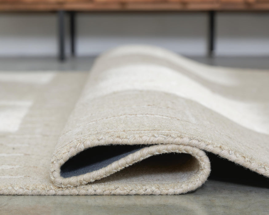 Wolbert 7'8" x 10' Area Rug - MI Hometown Furnishings (MI)*