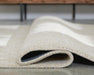 Wolbert 7'8" x 10' Area Rug - MI Hometown Furnishings (MI)*